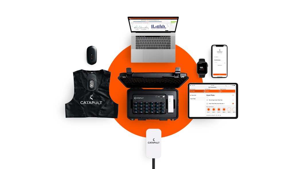 A collection of Catapult’s advanced athlete monitoring technology is displayed. This includes a laptop showing performance analytics, a mobile phone, a tablet, a smartwatch, a monitoring device, a Catapult branded vest, and a compact charging case with multiple tracking devices, all arranged around an orange circle.